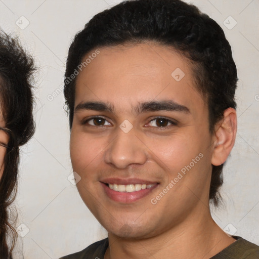 Joyful white young-adult male with medium  brown hair and brown eyes