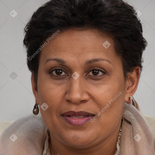 Joyful black adult female with short  brown hair and brown eyes