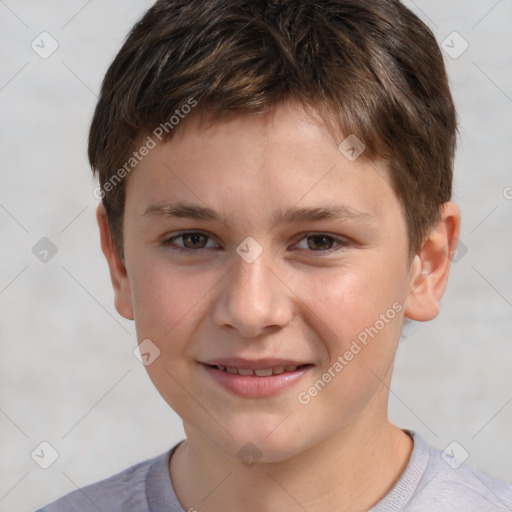 Joyful white child male with short  brown hair and brown eyes