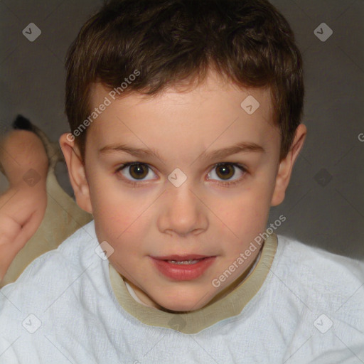 Joyful white child male with short  brown hair and brown eyes