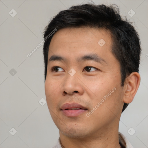 Neutral asian young-adult male with short  black hair and brown eyes