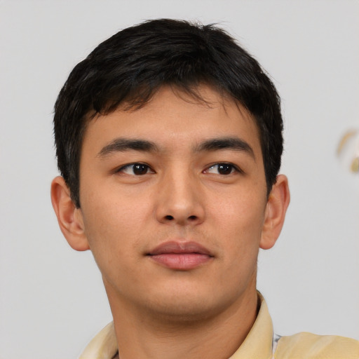 Neutral asian young-adult male with short  brown hair and brown eyes