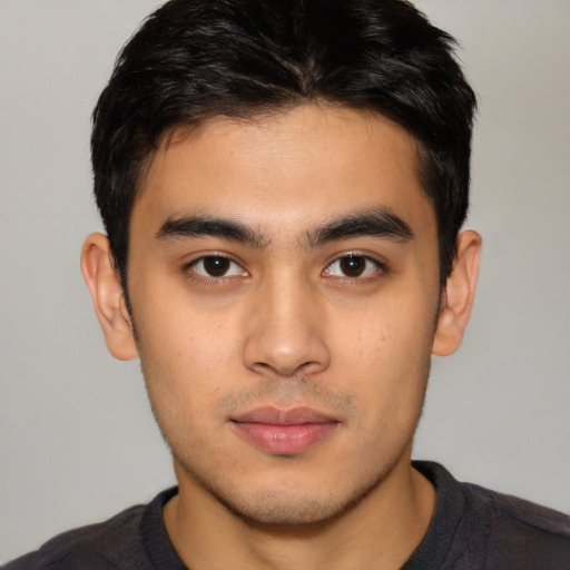 Neutral latino young-adult male with short  brown hair and brown eyes