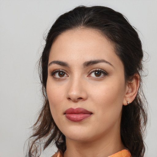 Neutral white young-adult female with long  brown hair and brown eyes