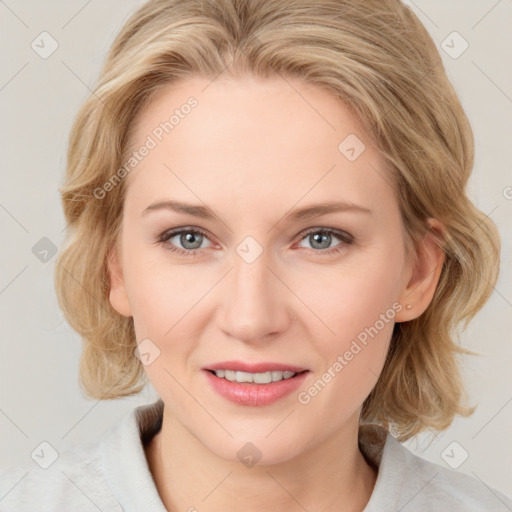 Joyful white young-adult female with medium  brown hair and blue eyes