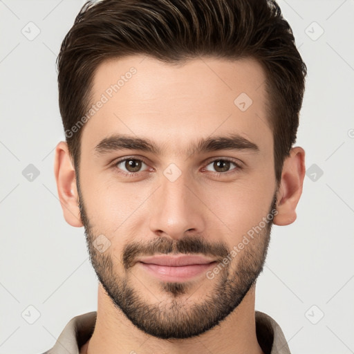 Joyful white young-adult male with short  brown hair and brown eyes