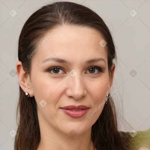 Joyful white young-adult female with long  brown hair and brown eyes