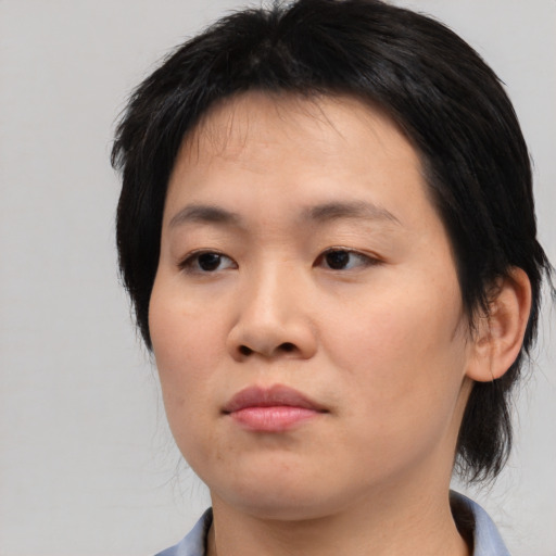 Neutral asian young-adult male with medium  black hair and brown eyes