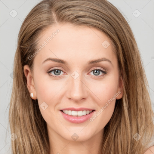 Joyful white young-adult female with long  brown hair and green eyes