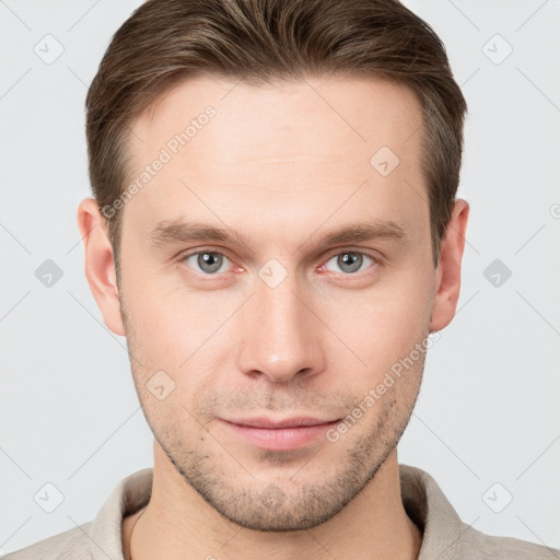 Neutral white young-adult male with short  brown hair and grey eyes