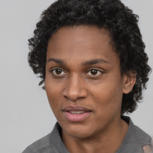 Neutral black young-adult female with short  black hair and brown eyes