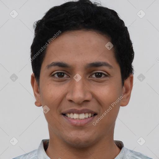 Joyful latino young-adult male with short  black hair and brown eyes