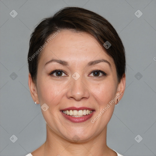 Joyful white adult female with short  brown hair and brown eyes