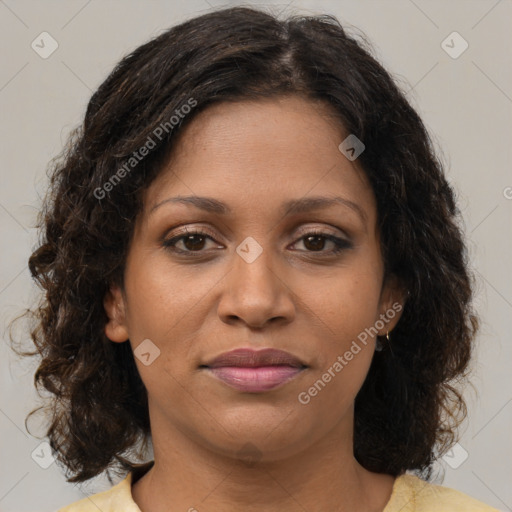 Joyful black young-adult female with medium  brown hair and brown eyes