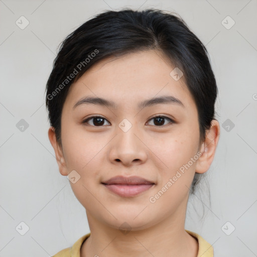 Joyful latino young-adult female with short  brown hair and brown eyes