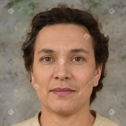 Joyful white adult female with short  brown hair and brown eyes