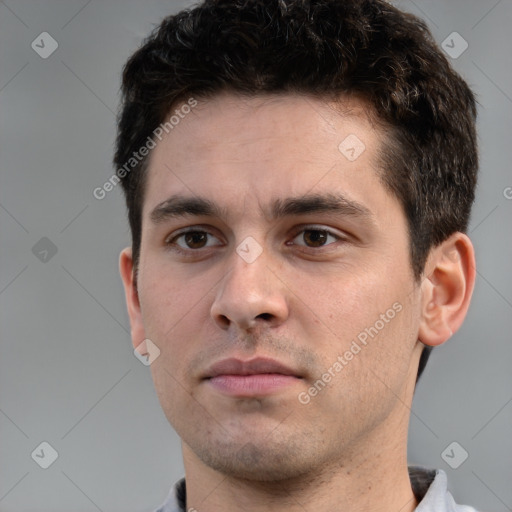 Neutral white young-adult male with short  brown hair and brown eyes