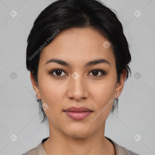 Joyful latino young-adult female with medium  black hair and brown eyes