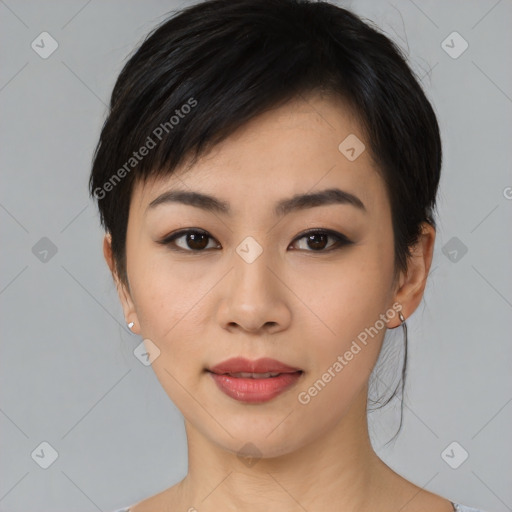 Joyful asian young-adult female with medium  black hair and brown eyes