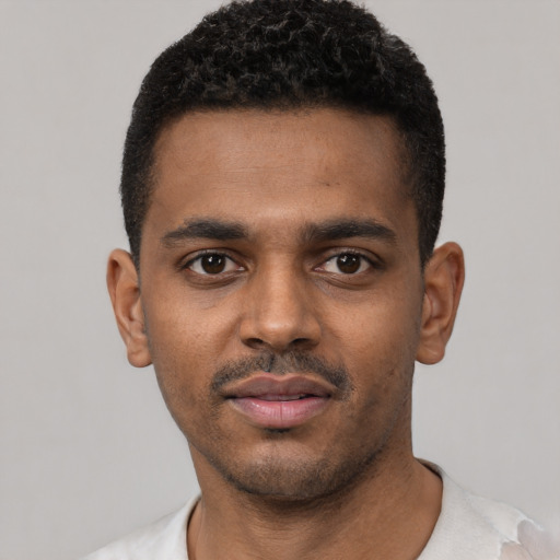 Neutral black young-adult male with short  black hair and brown eyes