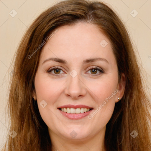 Joyful white young-adult female with long  brown hair and green eyes