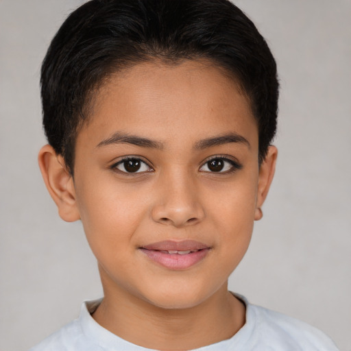 Joyful latino child female with short  brown hair and brown eyes