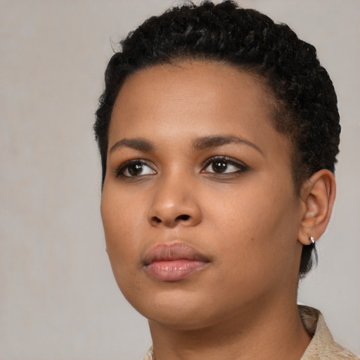 Neutral black young-adult female with short  black hair and brown eyes