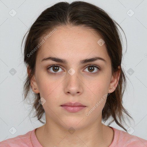 Neutral white young-adult female with medium  brown hair and brown eyes