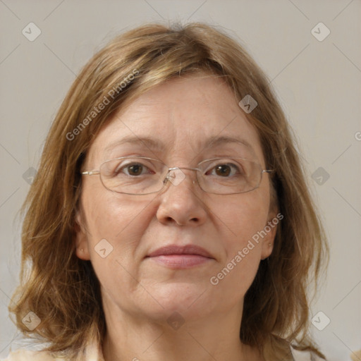 Joyful white adult female with medium  brown hair and green eyes