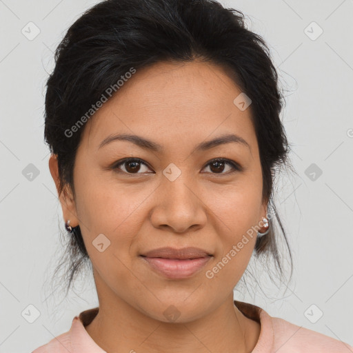 Joyful latino young-adult female with medium  brown hair and brown eyes