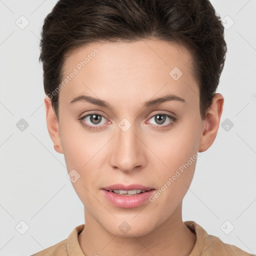 Joyful white young-adult female with short  brown hair and brown eyes