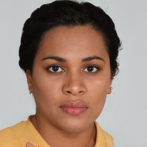 Neutral latino young-adult female with short  black hair and brown eyes