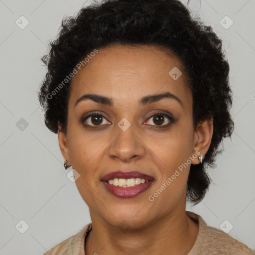 Joyful black young-adult female with short  black hair and brown eyes