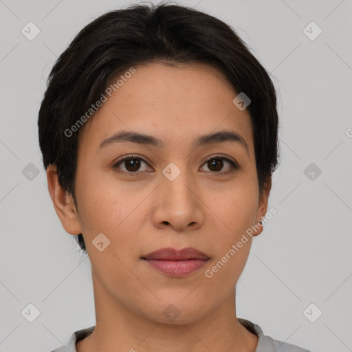 Joyful asian young-adult female with short  brown hair and brown eyes