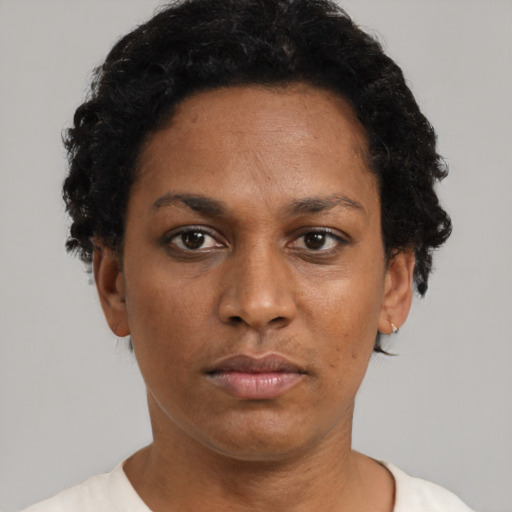 Neutral black adult female with short  black hair and brown eyes