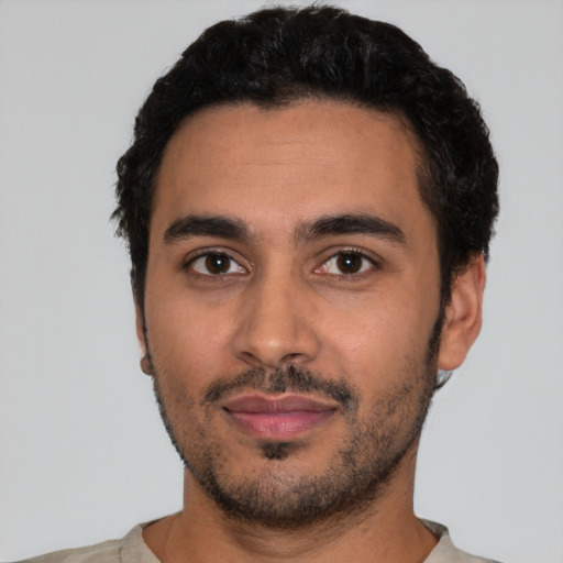 Neutral latino young-adult male with short  black hair and brown eyes