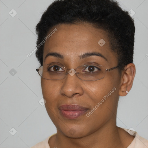 Joyful black young-adult female with short  brown hair and brown eyes