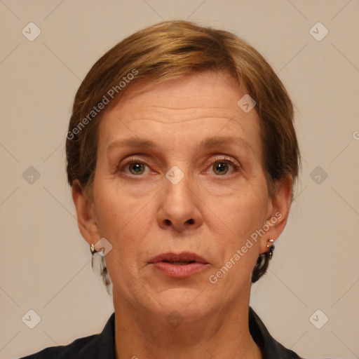 Joyful white adult female with short  brown hair and brown eyes