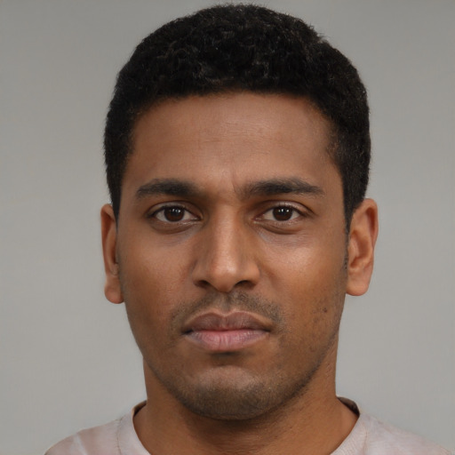 Neutral latino young-adult male with short  black hair and brown eyes