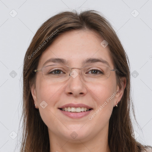 Joyful white adult female with long  brown hair and grey eyes