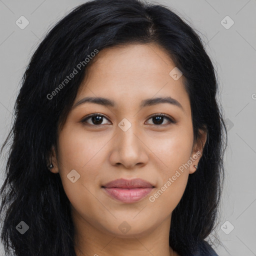 Joyful latino young-adult female with long  brown hair and brown eyes