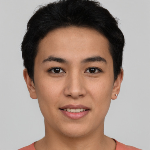Joyful white young-adult female with short  brown hair and brown eyes