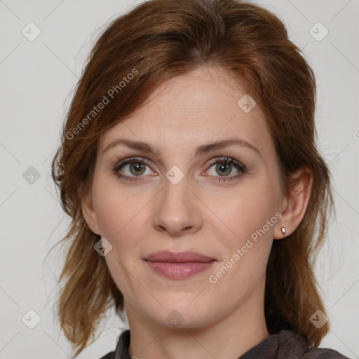 Joyful white young-adult female with medium  brown hair and blue eyes