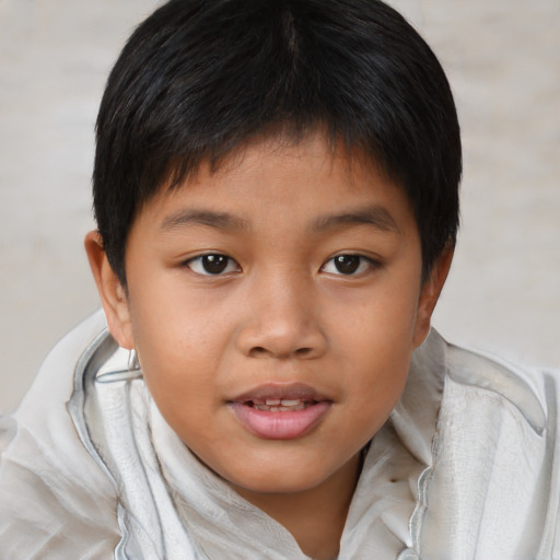 Joyful asian child female with short  brown hair and brown eyes