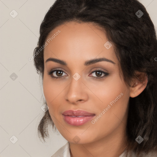 Joyful latino young-adult female with medium  brown hair and brown eyes