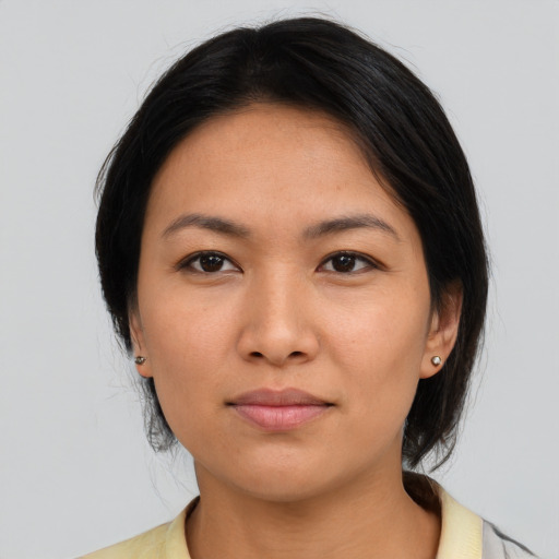 Neutral asian young-adult female with medium  black hair and brown eyes