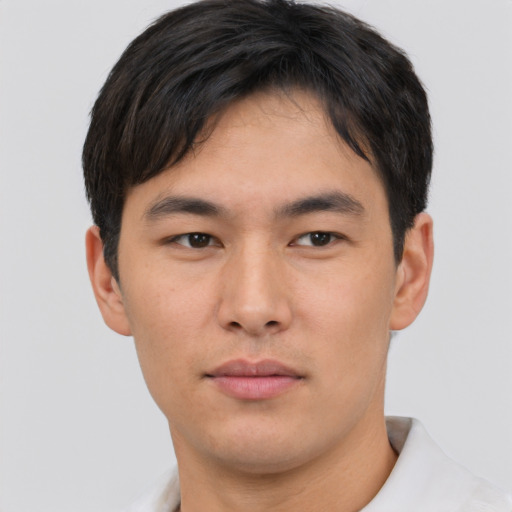 Neutral asian young-adult male with short  brown hair and brown eyes