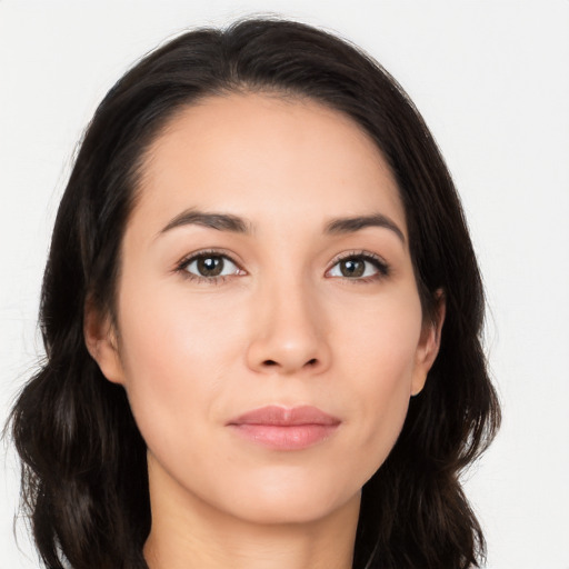 Joyful asian young-adult female with long  brown hair and brown eyes