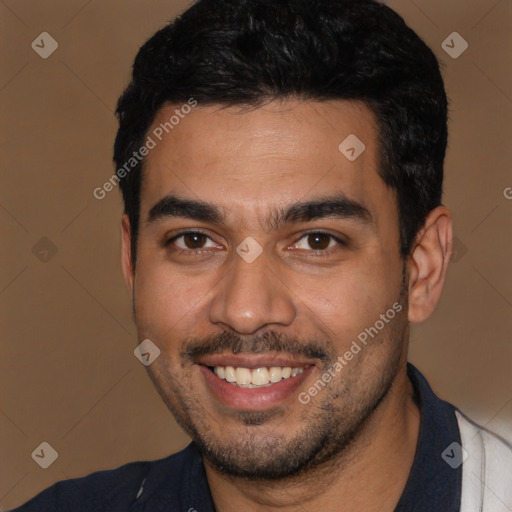 Joyful latino young-adult male with short  black hair and brown eyes