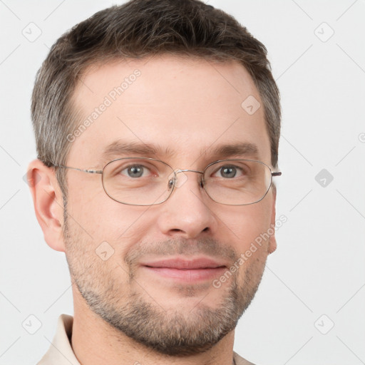 Joyful white adult male with short  brown hair and grey eyes